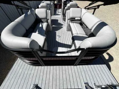 Slide: The Image of 2025 SunCatcher Select 322RC pontoon boat with spacious seating and modern design. - 10