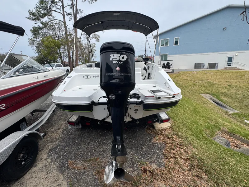 Slide: The Image of Rear view of a 2018 Tahoe 1950 boat with a 150 Pro outboard motor. - 2