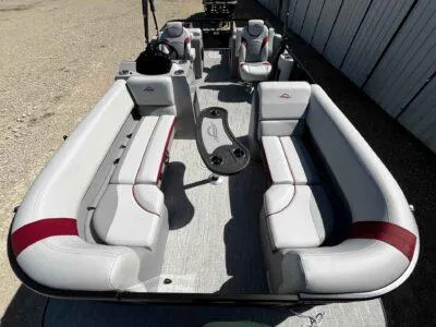 Slide: The Image of 2025 SunCatcher Select 322SS pontoon boat interior with spacious seating and modern design. - 6