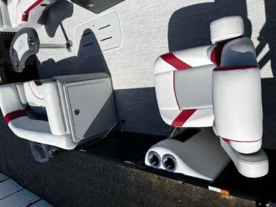 Slide: The Image of 2025 SunCatcher Select 322SS boat interior with white and red seating. - 8
