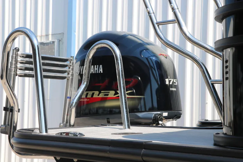 Slide: The Image of 2025 Sylvan Mirage X3 Party Fish with Yamaha 175 engine, docked with metal railings. - 17