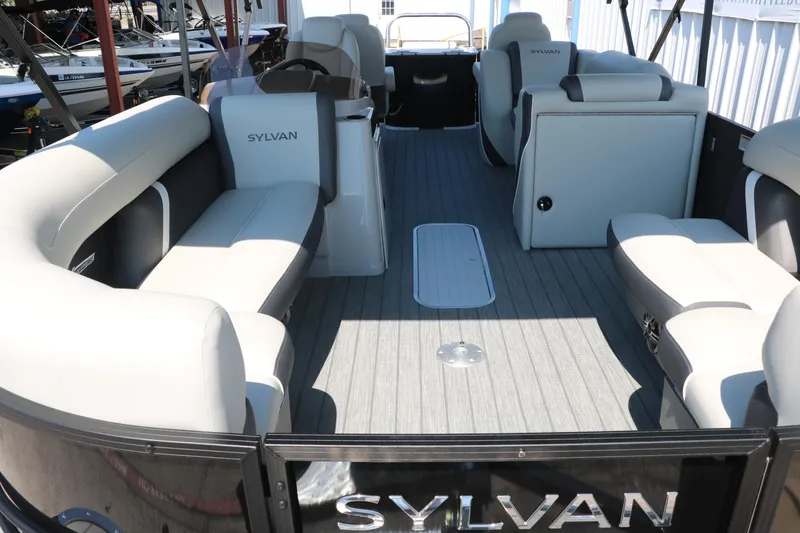 Slide: The Image of 2025 Sylvan Mirage X3 Party Fish pontoon boat interior with spacious seating. - 18
