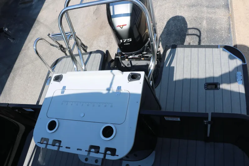 Slide: The Image of 2025 Sylvan Mirage X3 Party Fish boat with 175 HP engine, rear deck view. - 30