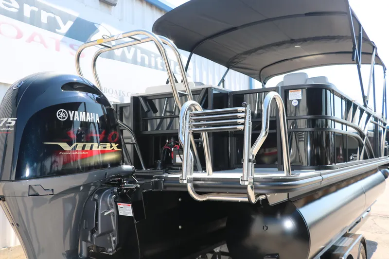 Slide: The Image of 2025 Sylvan Mirage X3 Party Fish pontoon boat with Yamaha VMAX engine. - 4