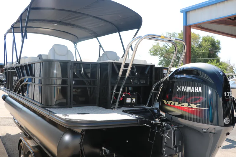 Slide: The Image of 2025 Sylvan Mirage X3 Party Fish pontoon boat with Yamaha VMAX engine. - 5