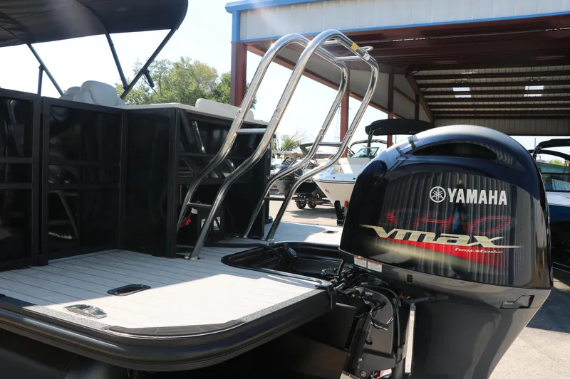 Slide: The Image of 2025 Sylvan Mirage X3 Party Fish with Yamaha VMAX engine, docked in a marina. - 6