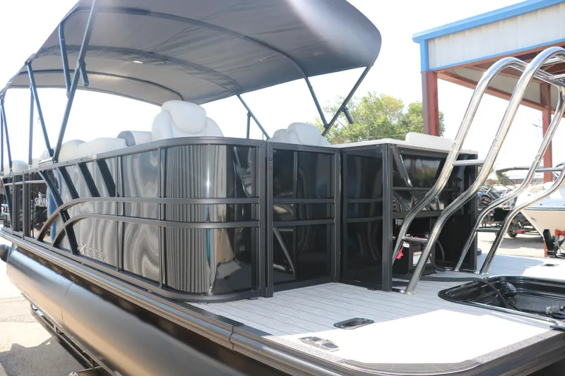 Slide: The Image of 2025 Sylvan Mirage X3 Party Fish pontoon boat with canopy and seating. - 7