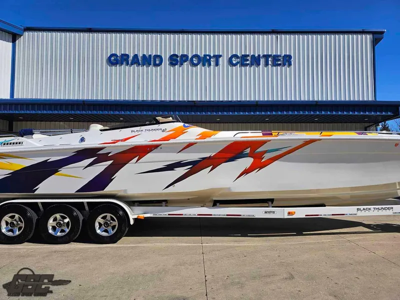 Slide: The Image of 2001 Black Thunder 43 GT Flat Deck boat at Grand Sport Center. - 2