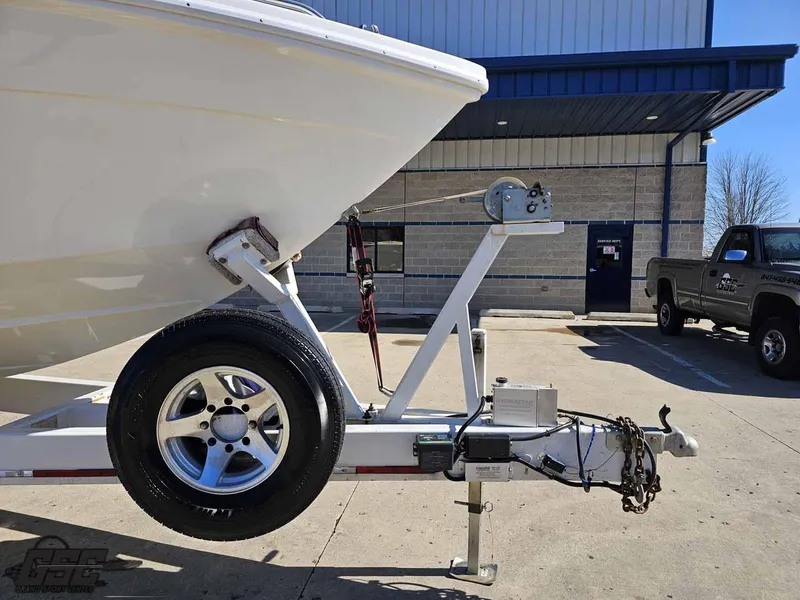 Slide: The Image of 2001 Black Thunder 43 GT Flat Deck boat on trailer, parked outdoors. - 24