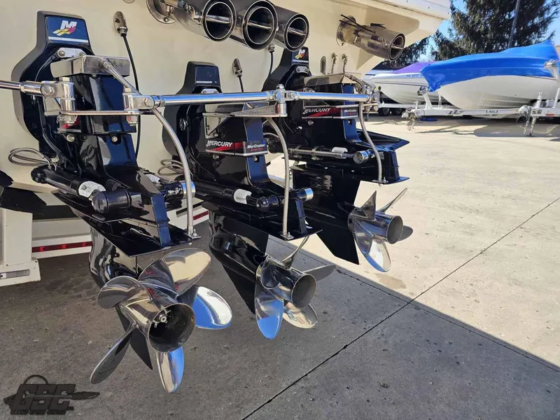 Slide: The Image of 2001 Black Thunder 43 GT Flat Deck boat with Mercury outboard motors and polished propellers. - 45