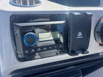 Slide: The Image of 2025 SunCatcher Select 322SS dashboard with Clarion audio system and SunCatcher panel. - 9