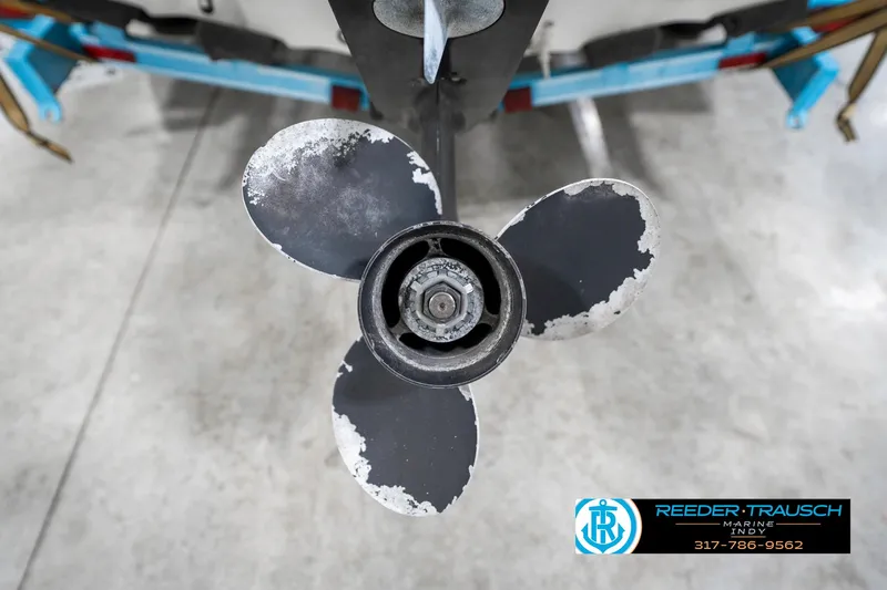 Slide: The Image of Propeller of 1991 Chaparral 1800 SL boat on trailer, close-up view. - 44