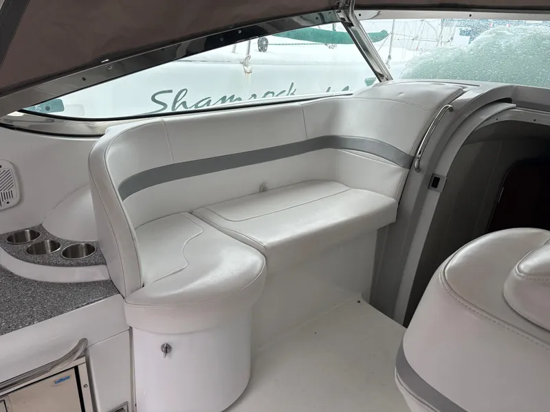 Slide: The Image of 2005 Formula 40pc yacht interior with white leather seating and sleek design. - 12