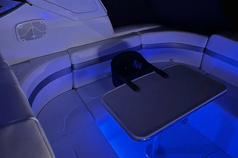 Slide: The Image of 2005 Formula 40pc boat interior with blue LED lighting and seating area. - 17
