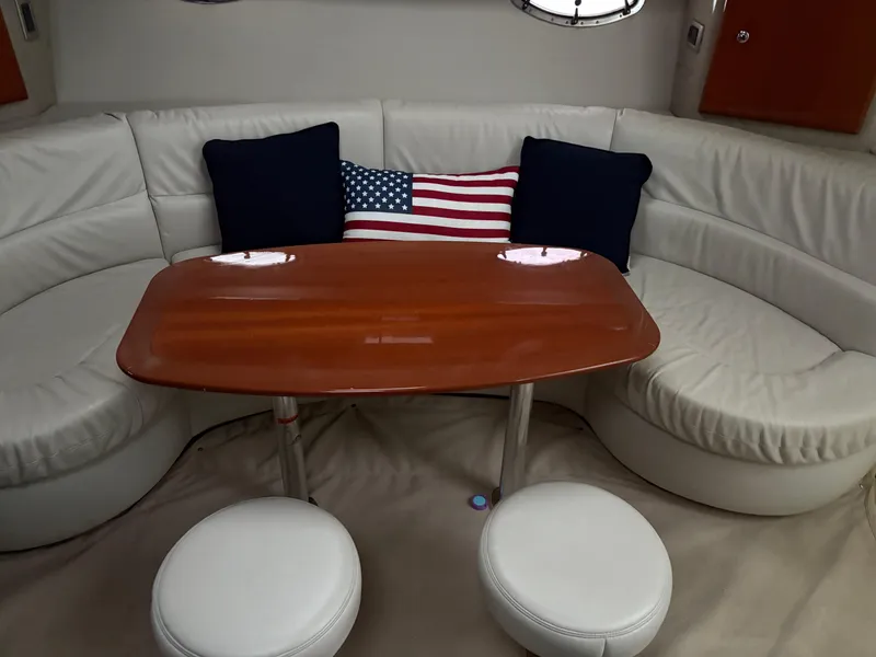 Slide: The Image of Luxurious 2005 Formula 40pc yacht interior with leather seating and American flag pillow. - 23