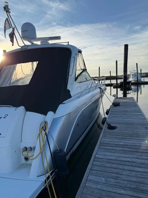 Slide: The Image of 2005 Formula 40pc yacht docked at marina during sunset. - 5