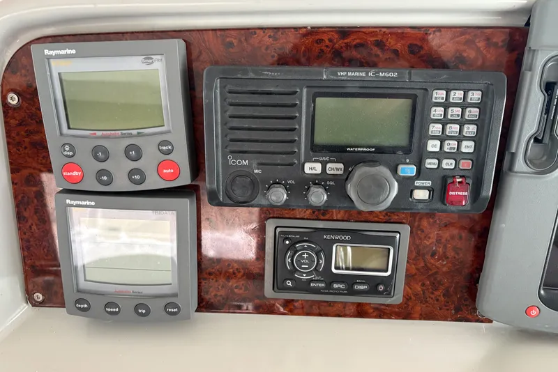 Slide: The Image of Control panel of a 2005 Formula 40pc boat with navigation and communication devices. - 7