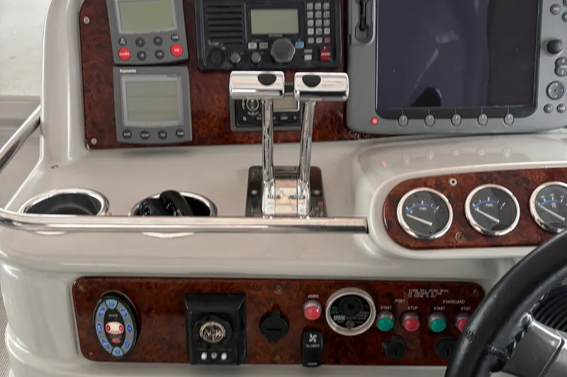 Slide: The Image of Control panel of a 2005 Formula 40pc boat with navigation and communication equipment. - 9