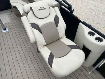Slide: The Image of Luxurious seating on 2025 SunCatcher Select 322RC boat with cup holders. - 8