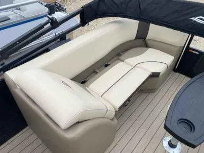 Slide: The Image of Luxurious seating on 2025 SunCatcher Select 322RC pontoon boat, featuring beige upholstery and sleek design. - 9