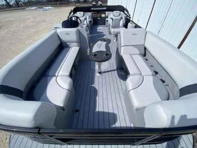 Slide: The Image of 2025 SunCatcher Select 322RC pontoon boat with spacious seating and modern design. - 4