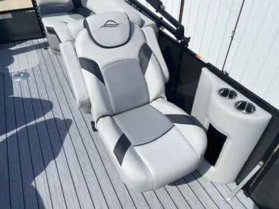 Slide: The Image of Luxurious seating on 2025 SunCatcher Select 322RC pontoon boat with cup holders. - 7