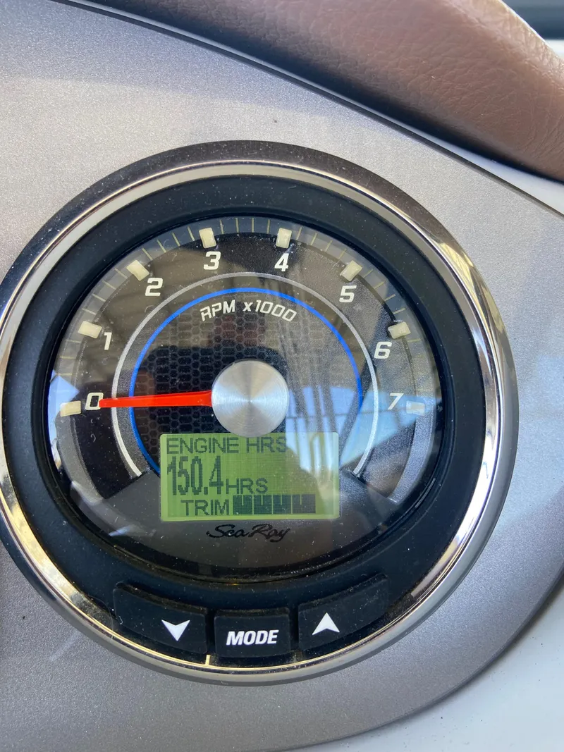 Slide: The Image of Close-up of 2016 Sea Ray 270 Sundeck tachometer showing 150.4 engine hours. - 8