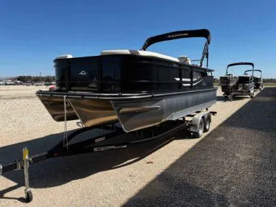 Slide: The Image of 2025 SunCatcher Select 322SS pontoon boat on trailer in outdoor setting. - 3