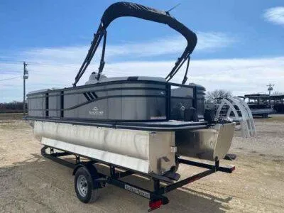 Slide: The Image of 2025 SunCatcher Select 320 RC pontoon boat on trailer, outdoor setting. - 3