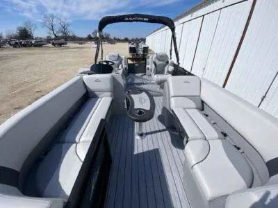 Slide: The Image of 2025 SunCatcher Select 320 RC pontoon boat with spacious seating and modern design. - 5
