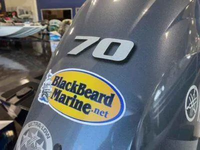 Slide: The Image of 2025 G3 Sportsman 1610 boat with BlackBeard Marine sticker and Yamaha logo. - 4
