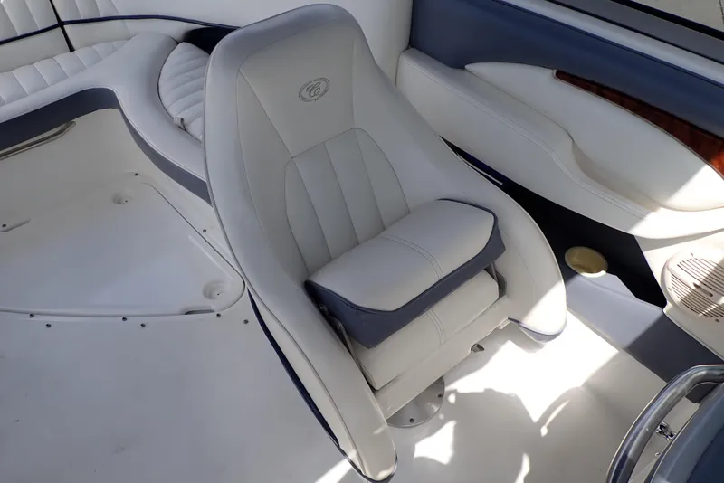 Slide: The Image of Luxurious interior of a 2002 Cobalt 240 boat with plush seating. - 21