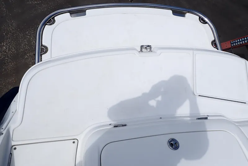 Slide: The Image of Rear deck of a 2002 Cobalt 240 boat with shadow silhouette. - 4
