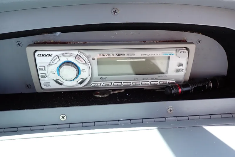 Slide: The Image of Sony car stereo in a 2002 Cobalt 240 dashboard compartment. - 46