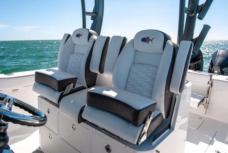 Slide: The Image of 2023 Crevalle 33 CSF boat interior with luxurious seating and ocean view. - 5