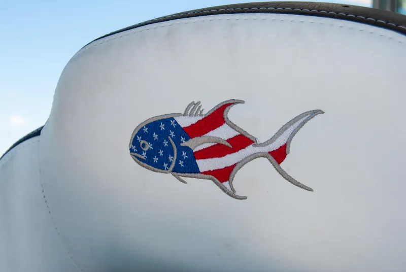 Slide: The Image of American flag fish design on 2023 Crevalle 33 CSF boat seat. - 59