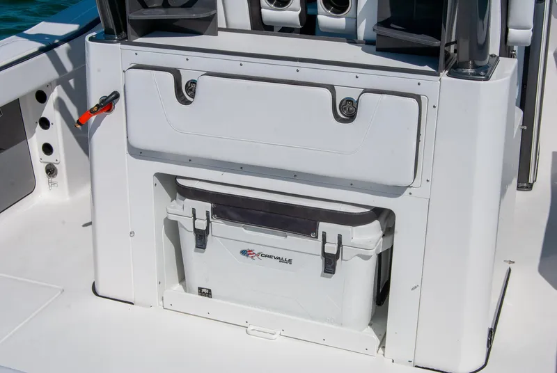 Slide: The Image of 2023 Crevalle 33 CSF boat with integrated cooler storage. - 9