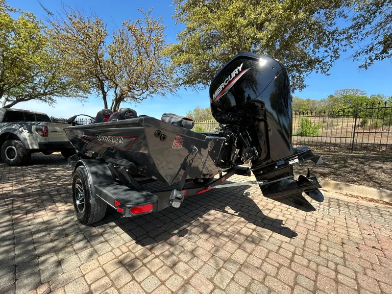 Slide: The Image of 2023 Ranger RT178 boat with Mercury engine on a sunny day. - 14
