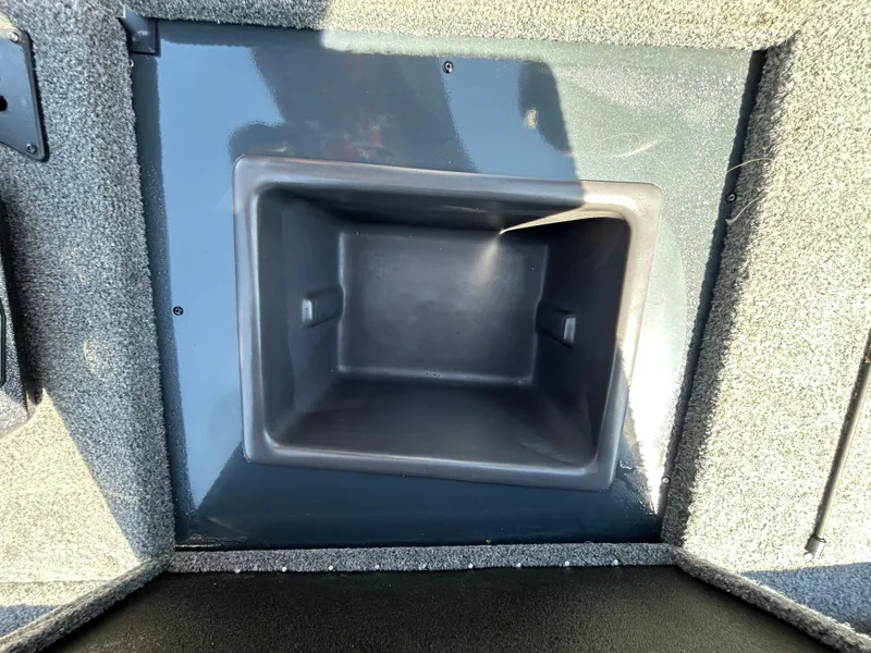 Slide: The Image of 2023 Ranger RT178 storage compartment with carpeted interior and sleek design. - 27