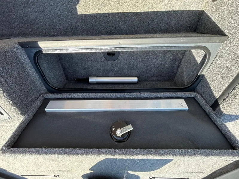 Slide: The Image of 2023 Ranger RT178 storage compartment with latch and handle, featuring a sleek interior design. - 30