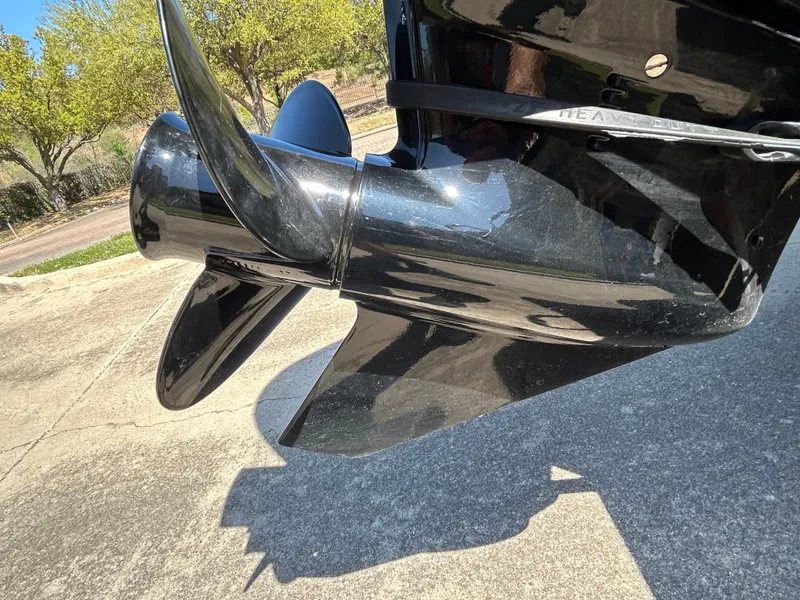 Slide: The Image of 2023 Ranger RT178 boat propeller in sunlight, showcasing sleek design and shiny finish. - 34