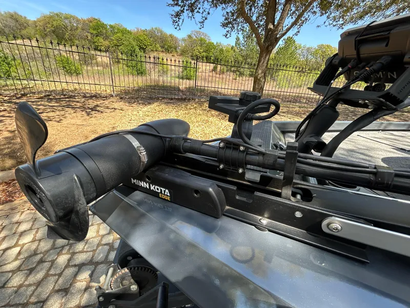 Slide: The Image of 2023 Ranger RT178 boat with Minn Kota Edge trolling motor, parked outdoors. - 46