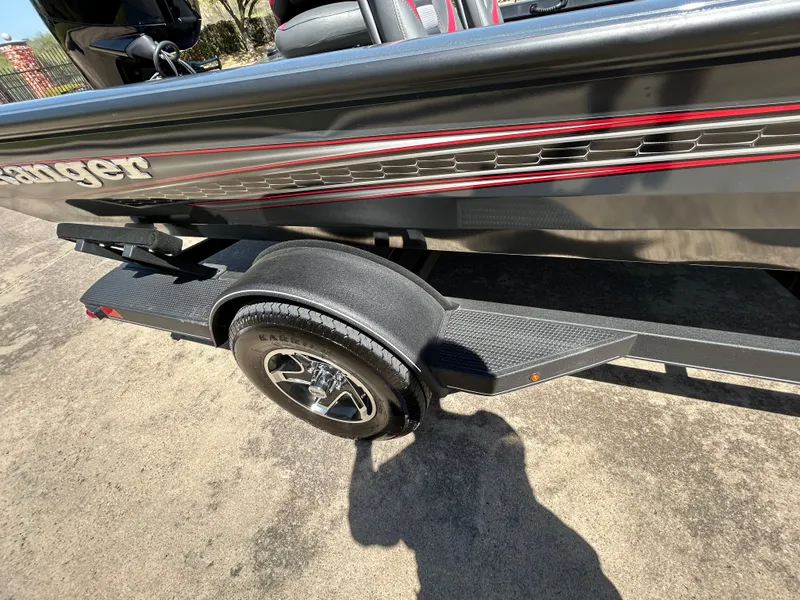 Slide: The Image of 2023 Ranger RT178 boat trailer with sleek design and red accents. - 48