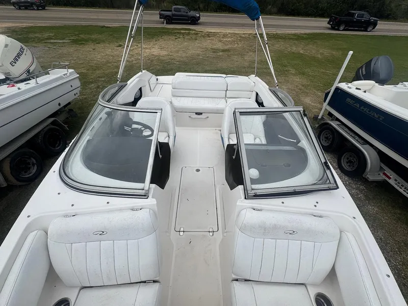 Slide: The Image of 2007 Regal 2000 Bowrider boat with white interior and open windshield. - 4