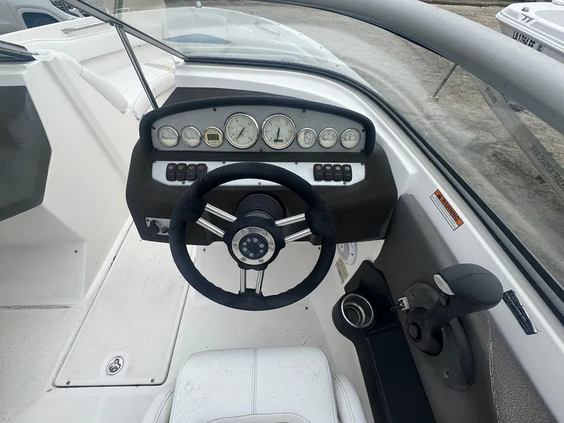 Slide: The Image of 2007 Regal 2000 Bowrider dashboard with steering wheel and instrument panel. - 7