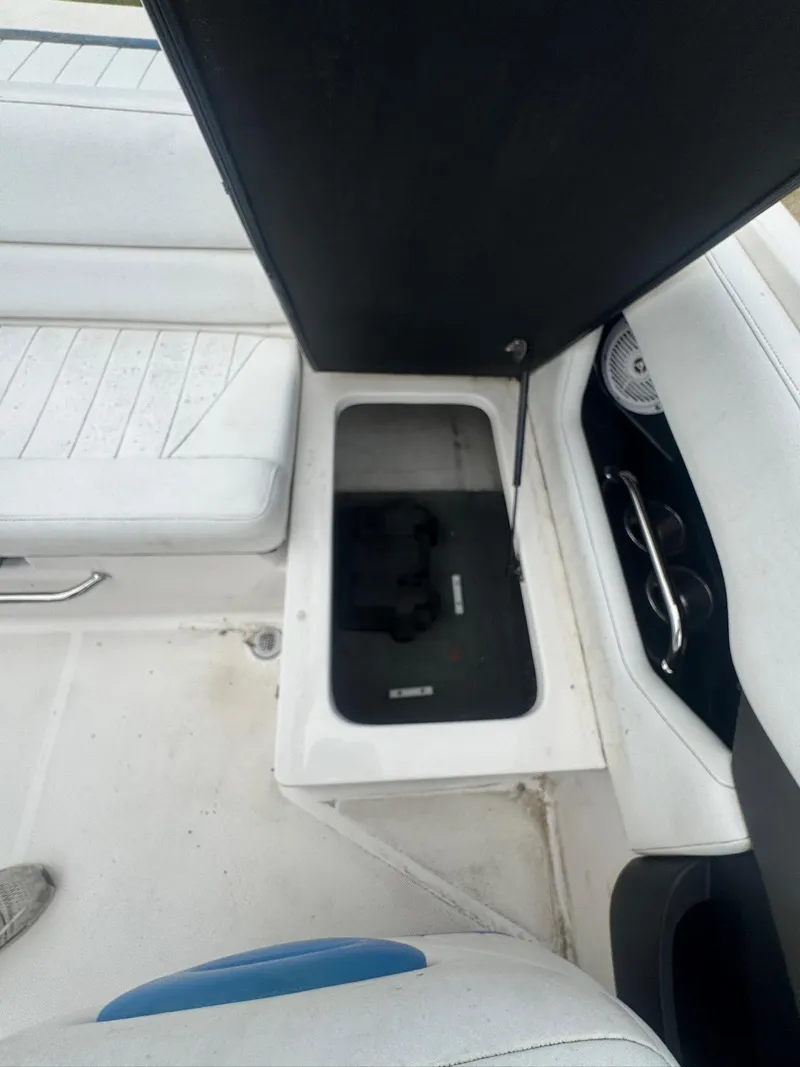 Slide: The Image of Open storage compartment in 2007 Regal 2000 Bowrider boat interior. - 8