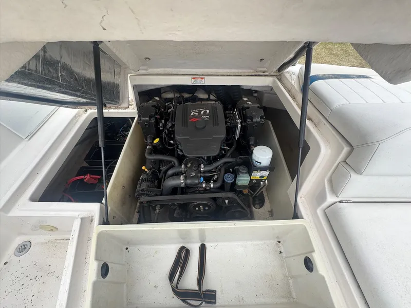 Slide: The Image of 2007 Regal 2000 Bowrider engine compartment with MerCruiser motor visible. - 9