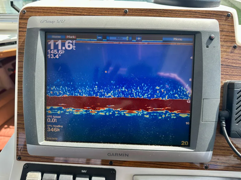 Slide: The Image of Garmin GPSmap 5212 displaying sonar data on a 2008 Back Cove 33 Express boat. - 31