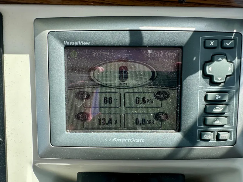 Slide: The Image of SmartCraft display on 2008 Back Cove 33 Express showing vessel data and controls. - 33