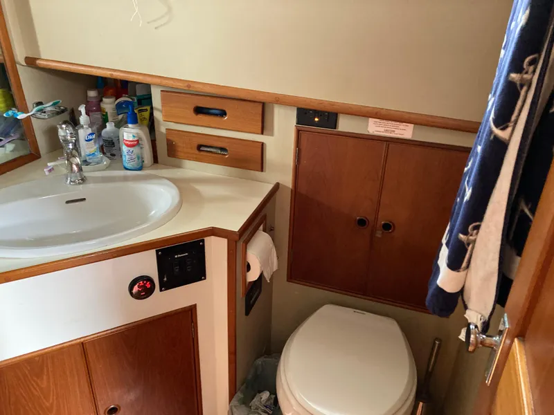 Slide: The Image of Bathroom interior of 1985 Grand Banks 42 Classic yacht with sink and toilet. - 28